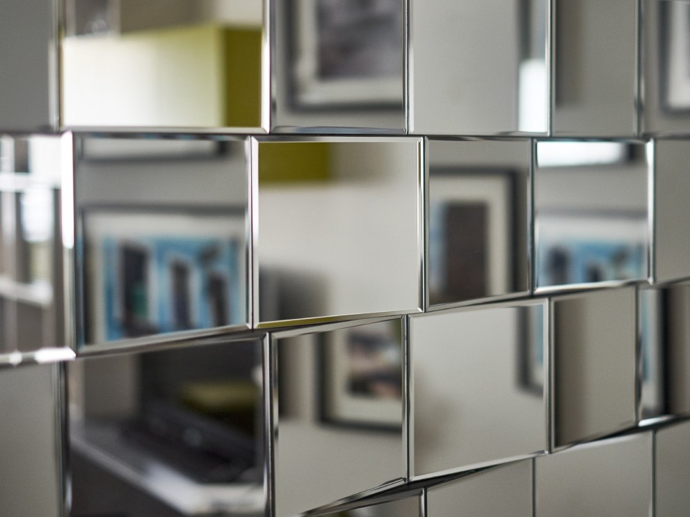 Apartment in the city  | Detail of striking mirror with reflection of tones and shades of fresh colour palette | Interior Designers